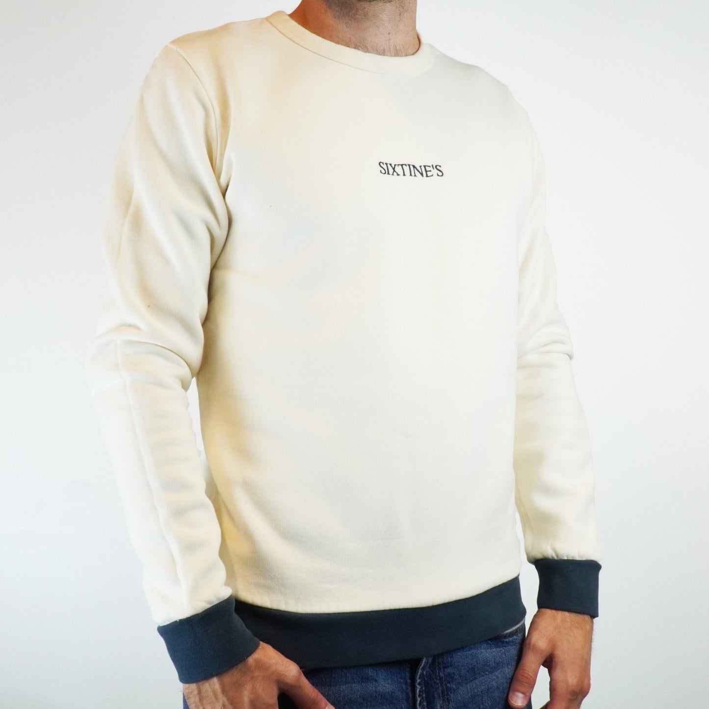 Two-tone cream with logo